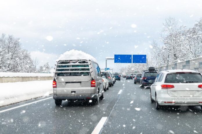 traffic-jam-due-ti-bad-weather-conditions-vehicles-road-winter-165205022